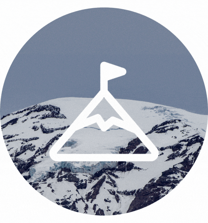 White mountain icon with a flag on top overlaid on a snowy mountain peak.